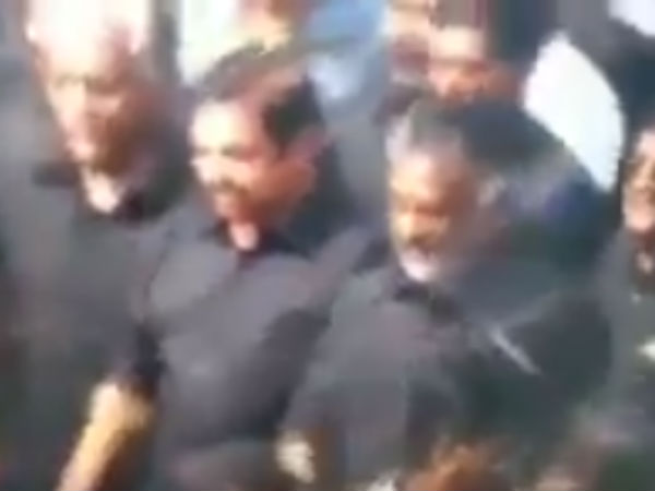 சிரித்துக் கொண்டே...