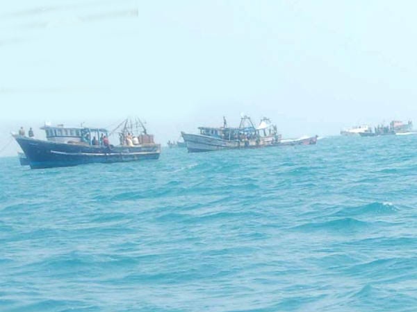 Sri Lankan navy shoots the boats of TN fishermen Sri Lankan navy shoots the boats of TN fishermen