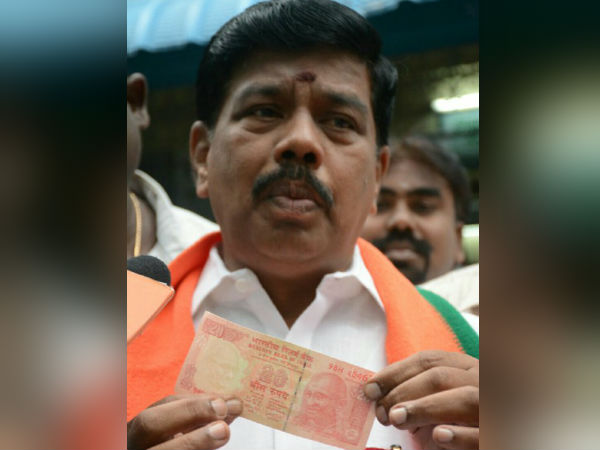BJP candidate calls Dinakaran as Cooker Company BJP candidate calls Dinakaran as Cooker Company