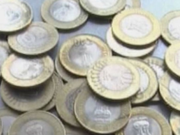நிரம்பி வழியும் நாணயங்கள்