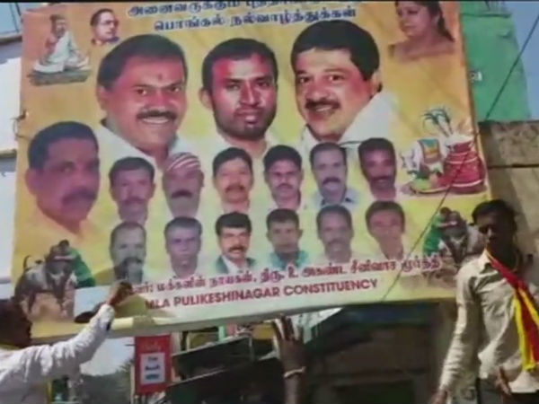 Pro-Kannada activists tear off Actor Vijay picture from a van in Bengaluru Pro-Kannada activists tear off Actor Vijay picture from a van in Bengaluru