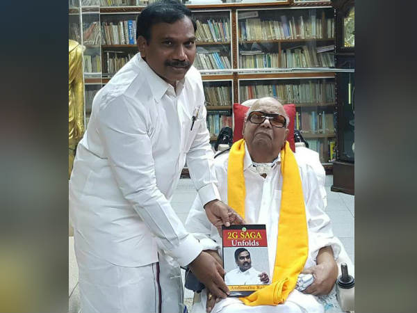 Raja gives 2g saga unfolds book to Karunanidhi Raja gives 2g saga unfolds book to Karunanidhi
