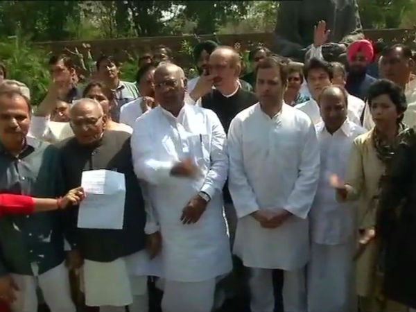Congress leaders protesting outside Gandhi Statue in Parliament Congress leaders protesting outside Gandhi Statue in Parliament