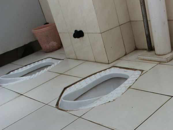 Students Asked To Clean School Toilet With Mid-Day Meal Plates Students Asked To Clean School Toilet With Mid-Day Meal Plates