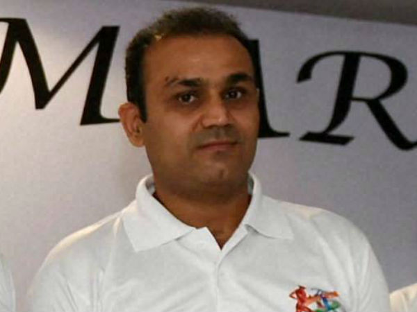 Virender Sehwag handed over financial aid worth Rs 1.5 lakh to the family of Madhu in Attapadi Virender Sehwag handed over financial aid worth Rs 1.5 lakh to the family of Madhu in Attapadi