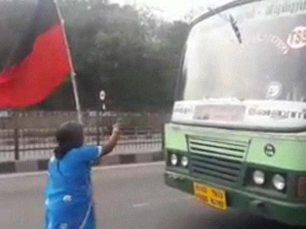 Old lady stop the bus on the National Highway in Ambur Old lady stop the bus on the National Highway in Ambur