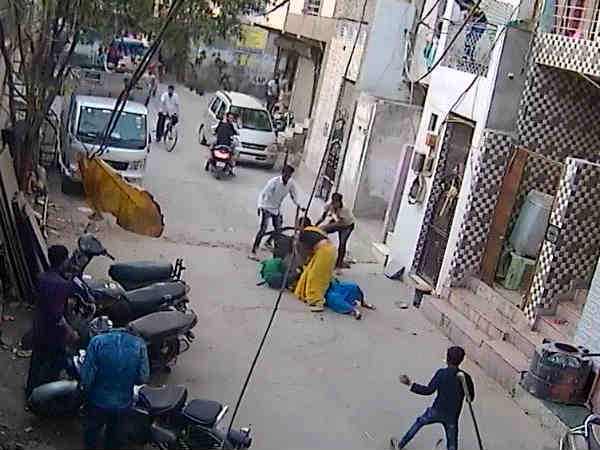 Dog attacks boy and woman fight with dog in Delhi Dog attacks boy and woman fight with dog in Delhi