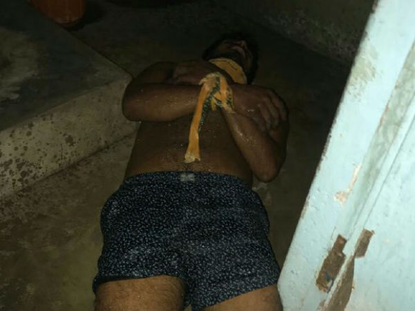 கை கால்கள் கட்டப்பட்ட நிலையில்