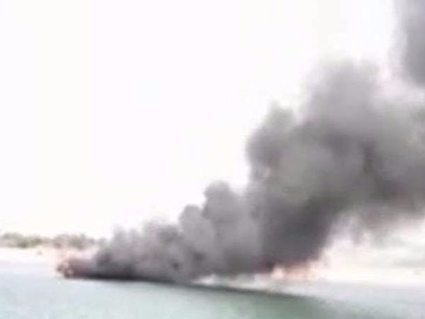 A Tourist boat got fire in Godavari river in Andhra A Tourist boat got fire in Godavari river in Andhra