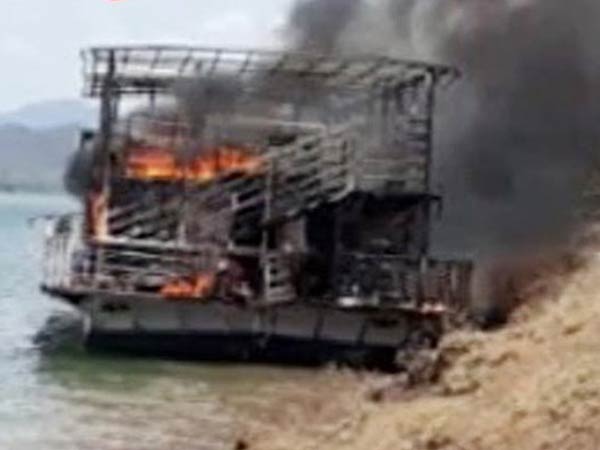 A Tourist boat got fire in Godavari river in Andhra A Tourist boat got fire in Godavari river in Andhra