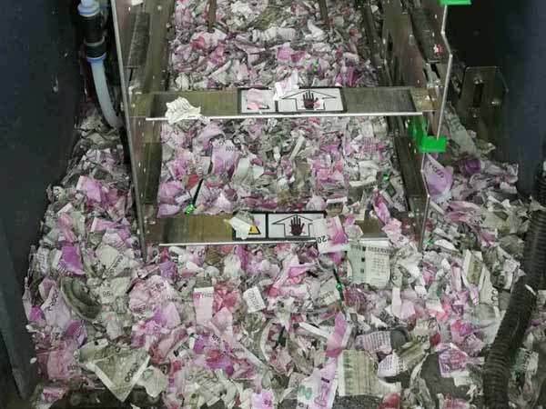Rats Demonetisation: Smashes Rs.12 lakhs with bites in SBI ATM Rats Demonetisation: Smashes Rs.12 lakhs with bites in SBI ATM