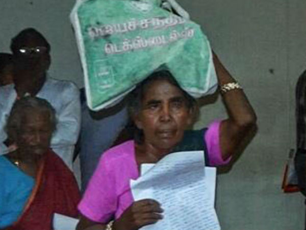 Old woman came collector office with 13 kg petition Old woman came collector office with 13 kg petition