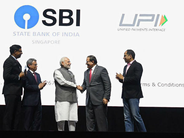 Modi in Singapore: Launches three Indian mobile payment apps at a business event Modi in Singapore: Launches three Indian mobile payment apps at a business event