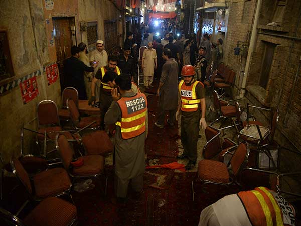 Bomb blast kills at least 12 at Pakistan political rally Bomb blast kills at least 12 at Pakistan political rally