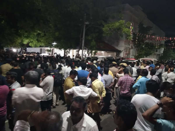 DMK members standing outside Gopalapuram house as their leader Karunanidhis health gets Decline DMK members standing outside Gopalapuram house as their leader Karunanidhis health gets Decline