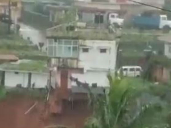 A house slipping toward a deep fall in Kodagu A house slipping toward a deep fall in Kodagu