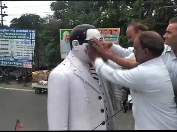 Statue of Ambedkar Purified after RRS Leader garlanded it Statue of Ambedkar Purified after RRS Leader garlanded it