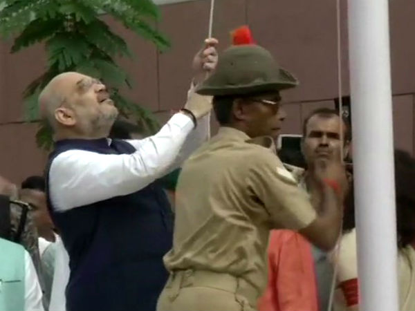 Congress party alleges Amit shah disrespects National flag Congress party alleges Amit shah disrespects National flag