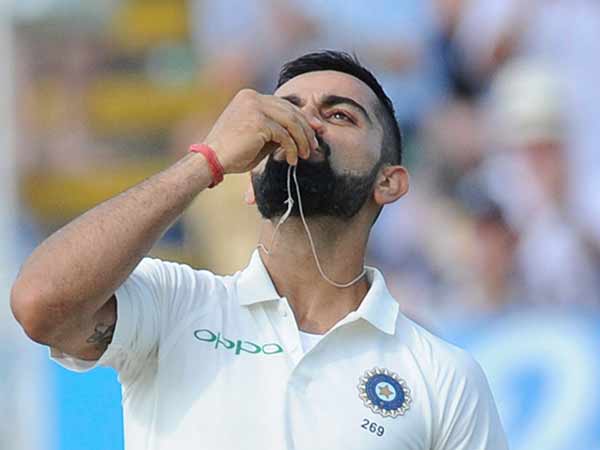 Kohli kisses marriage ring after century Kohli kisses marriage ring after century