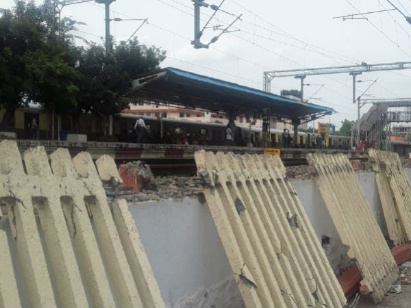 Wall in the Chennai St Thomas Mount Railway station demolished Wall in the Chennai St Thomas Mount Railway station demolished