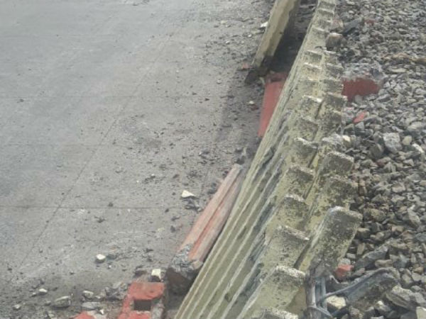 Wall in the Chennai St Thomas Mount Railway station demolished Wall in the Chennai St Thomas Mount Railway station demolished