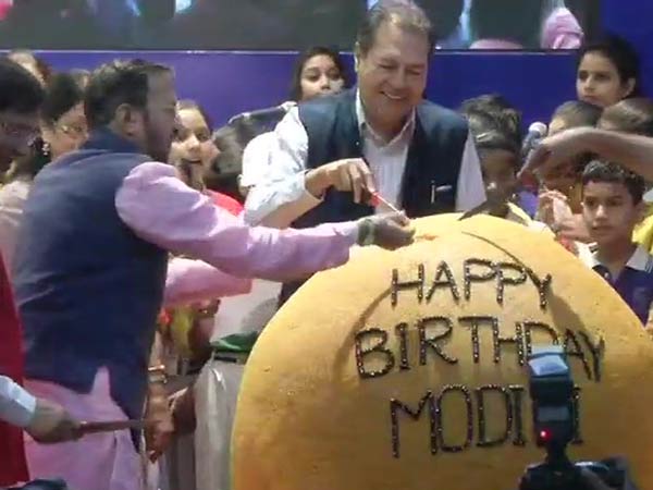 Ministers celebrate Modi birthday by cutting 568 kg laddu Ministers celebrate Modi birthday by cutting 568 kg laddu