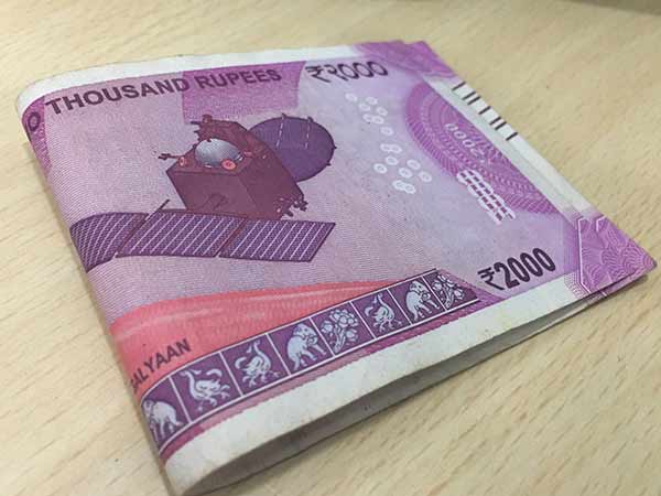 RBI tweak norms for exchange of torn currency RBI tweak norms for exchange of torn currency