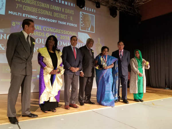 Tamilisai soundarrajan received award at Chicago and dedicated it to tamil people and BJP cadres Tamilisai soundarrajan received award at Chicago and dedicated it to tamil people and BJP cadres