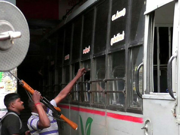 Policeman place his gun in bus seat to occupy place in Coonoor Policeman place his gun in bus seat to occupy place in Coonoor