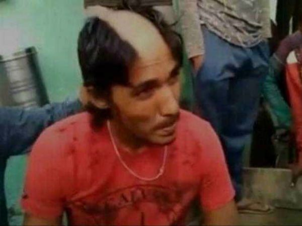 man head shaved for posting morphed pictures with girls man head shaved for posting morphed pictures with girls