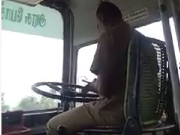 a government bus driver using cell phone while he driving in ramnad a government bus driver using cell phone while he driving in ramnad