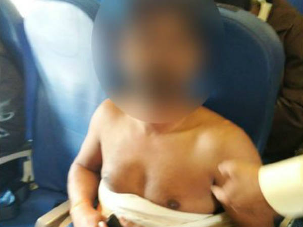 passenger strips mid air on air india express flight, in lucknow passenger strips mid air on air india express flight, in lucknow