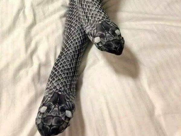 woman wears snake looking stockings husband beats her mistaking it for two real snakes woman wears snake looking stockings husband beats her mistaking it for two real snakes
