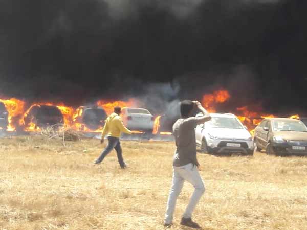 Bengaluru Aero India 2019: Fire breaks out at car parking area Bengaluru Aero India 2019: Fire breaks out at car parking area