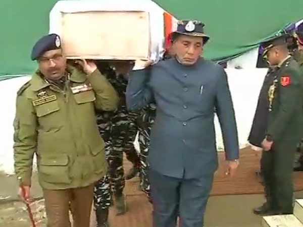 Rajnath Singh lend a shoulder to mortal remains of a CRPF soldier Rajnath Singh lend a shoulder to mortal remains of a CRPF soldier