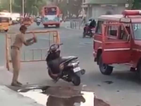 A police constable attacks a bike in Chennai A police constable attacks a bike in Chennai