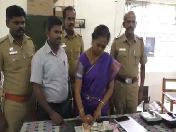 Election officials seizes un accounted money from an auto near tenkasi Election officials seizes un accounted money from an auto near tenkasi