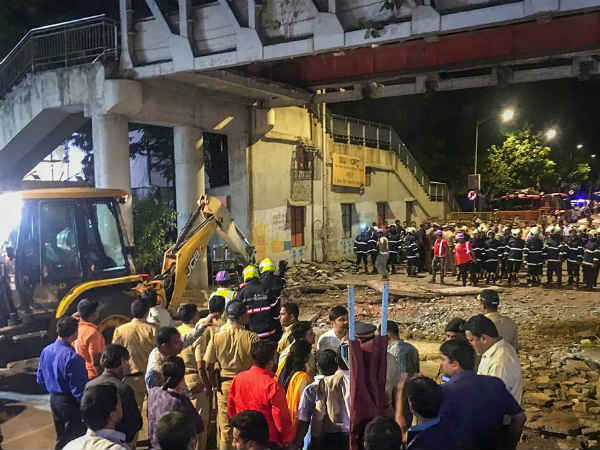 Mumbai: A foot over bridge near Chhatrapati Shivaji Maharaj Terminus (CSMT) railway station has collapsed. Mumbai: A foot over bridge near Chhatrapati Shivaji Maharaj Terminus (CSMT) railway station has collapsed.
