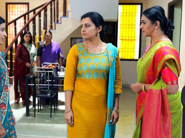 Azhagammai chases her husband with watchman Azhagammai chases her husband with watchman