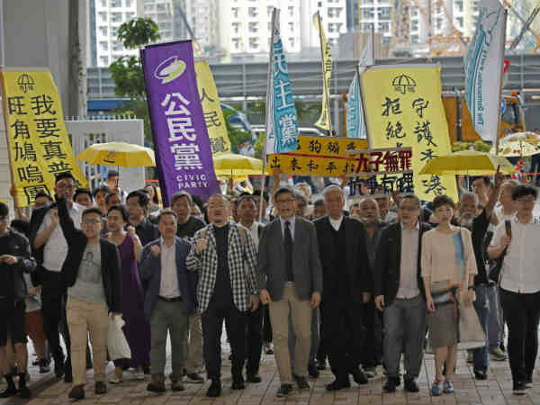 Occupy leaders jailed for 2014 democracy protests.. protest erupted in Hong Kong Occupy leaders jailed for 2014 democracy protests.. protest erupted in Hong Kong