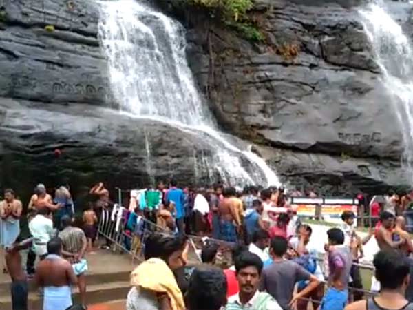 Tourists throng Courtallam for take a bath in falls Tourists throng Courtallam for take a bath in falls
