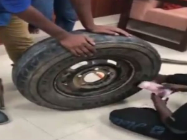 Rs 2.30 cr in cash stuffed inside the spare tire in a car seized by Income-Tax officials. Rs 2.30 cr in cash stuffed inside the spare tire in a car seized by Income-Tax officials.