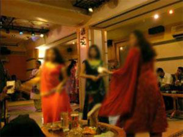 BMC official among 15 held in raid at Mumbai dance bar BMC official among 15 held in raid at Mumbai dance bar