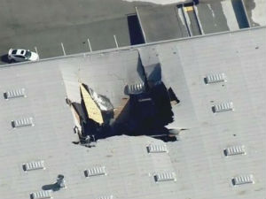In California, a fighter plane collided with the building .. pilot survived by parachute In California, a fighter plane collided with the building .. pilot survived by parachute