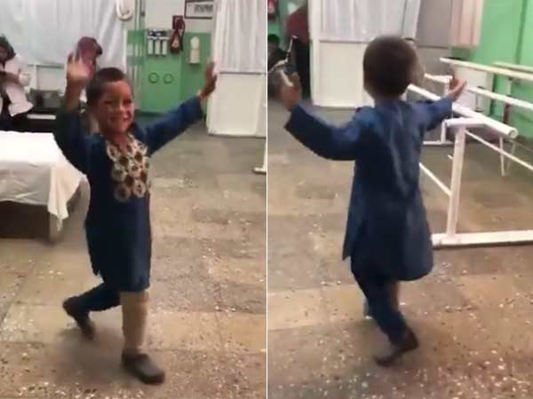 Landmine victim boy dances after got a prosthetic leg Landmine victim boy dances after got a prosthetic leg