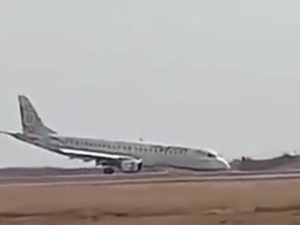 A Myanmar plane landed with out front weel A Myanmar plane landed with out front weel