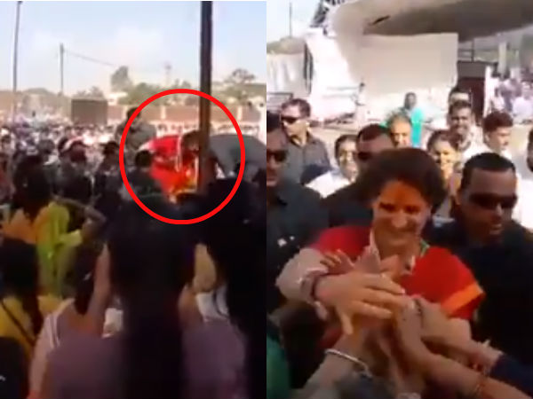 Priyanka Gandhis jumps over the barricade to see women in a rally in MP Priyanka Gandhis jumps over the barricade to see women in a rally in MP