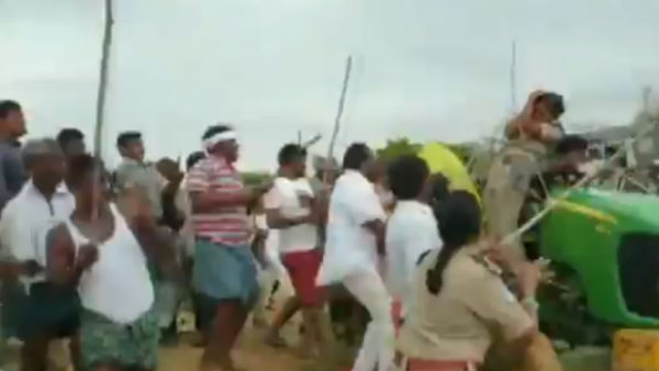 Telangana Rashtra Samithi workers attacked women forest officer during a tree plantation drive Telangana Rashtra Samithi workers attacked women forest officer during a tree plantation drive