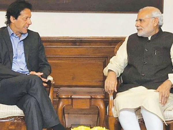 Narendra Modi exchanged pleasantries with the Imran Khan Narendra Modi exchanged pleasantries with the Imran Khan