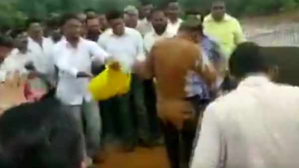 Cong MLA Nitesh Narayan Rane throw mud on engineer at Mumbai-Goa highway Cong MLA Nitesh Narayan Rane throw mud on engineer at Mumbai-Goa highway